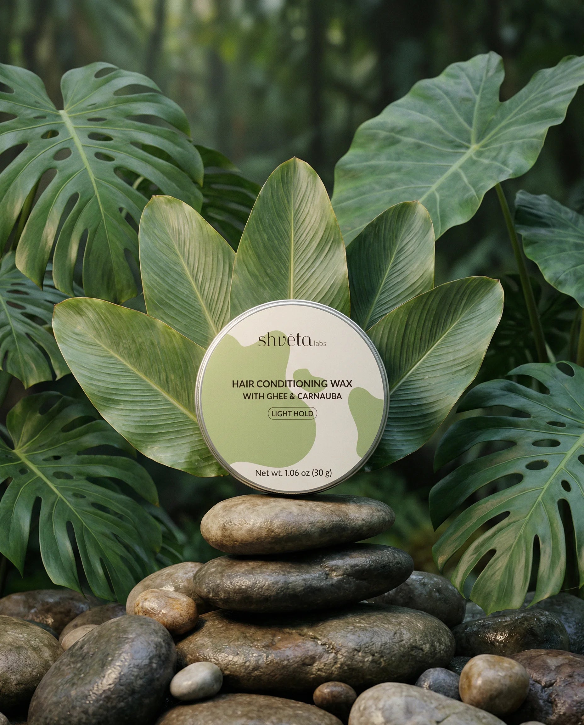 shveta labs hair conditioning wax on stones with green leaves in the background